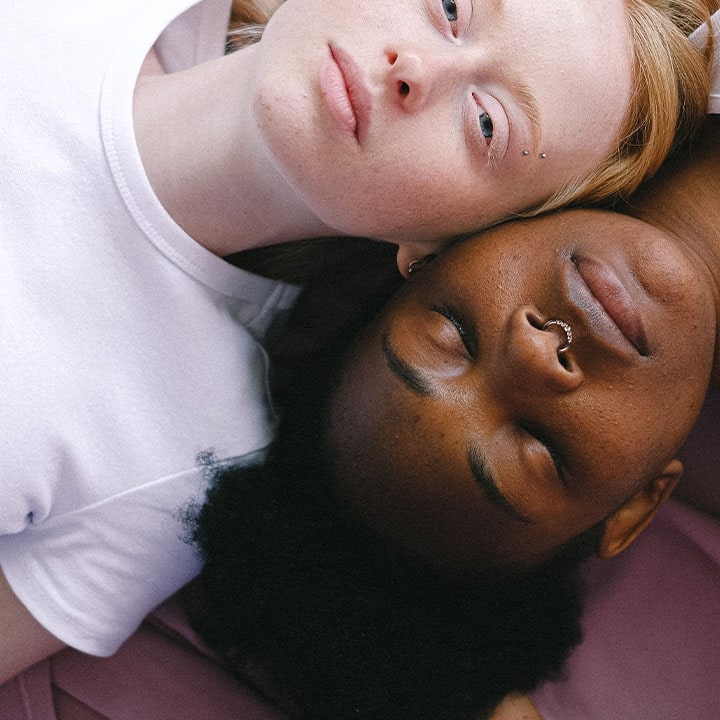 2 women with piercings