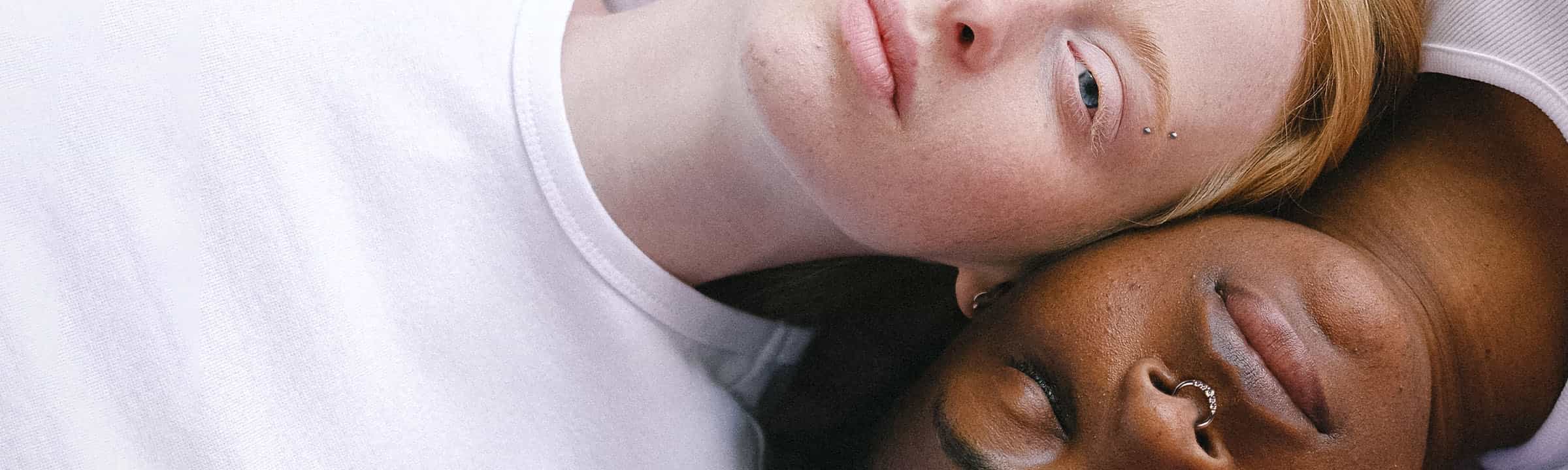 2 women with piercings